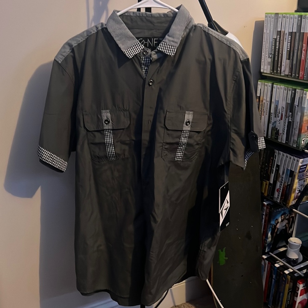 gray button up shirt, got it one year for Christmas but it not really my style